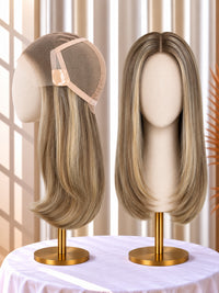 Welded lace wig, dark blonde to light brown wig samples on stands with visible lace cap