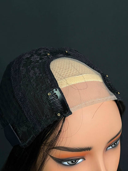 Straight U-part wig close-up: beige mesh U-part panel on black hair