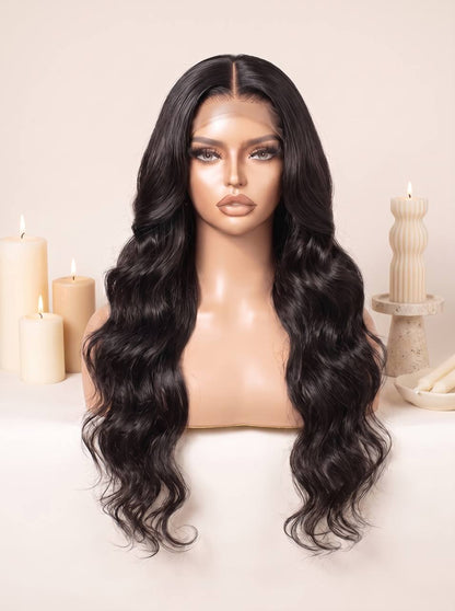 Black lace wig with deep wave curls, long length, center part, and styled volume