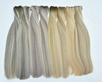 Straight hair weft bundle with gray-to-blonde gradient strands