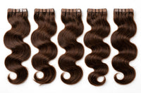 Wavy tape-in weft hair extension set with tape tabs; long loose waves in chestnut brown