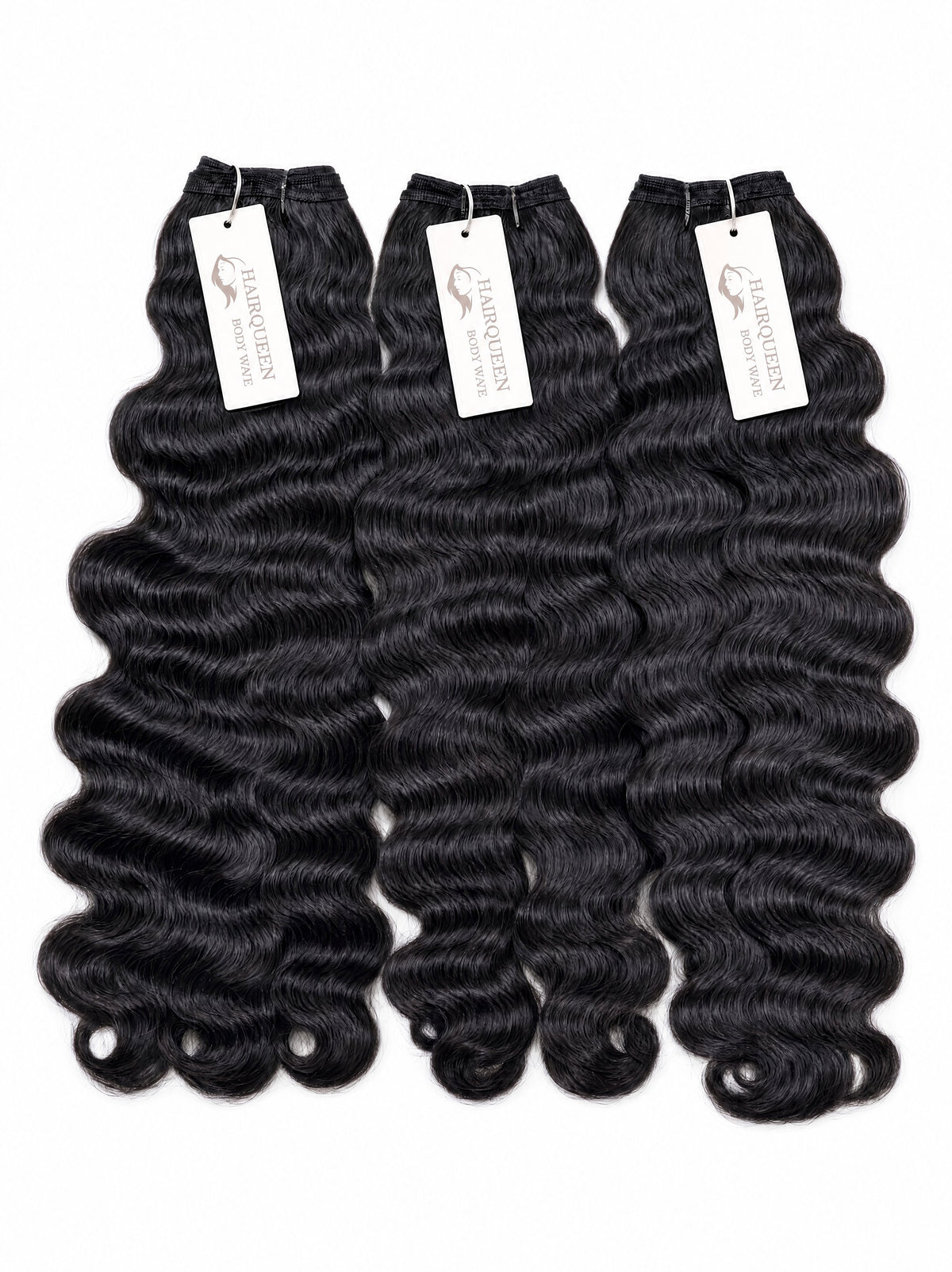 Black loose-wave human hair bundles, 3 pieces with white brand tags.