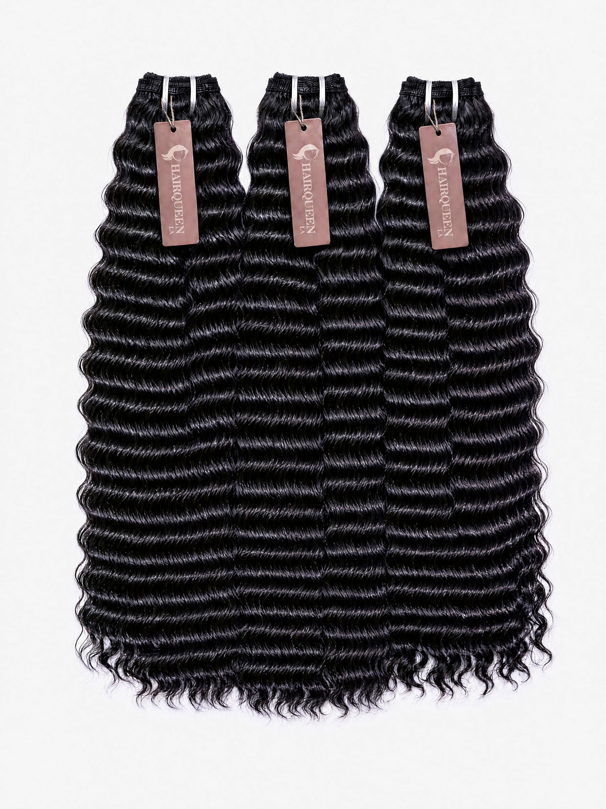 Raw Indian hair bundles, three black loose-wave wefts with silver clips and pink tags