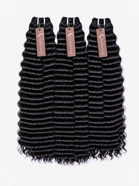 Raw Indian hair bundles, black loose-wave wefts with clips and hanging tags