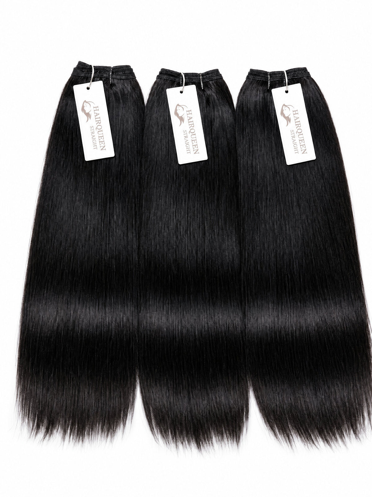 Black straight human hair bundles, 3 pieces with white brand tags.