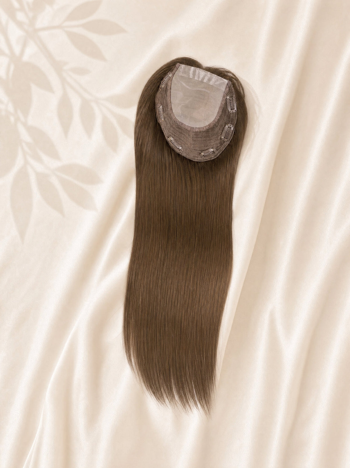 Silk Base medical hair topper hairpiece, long medium-brown strands with circular silk base.