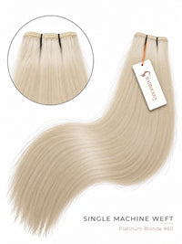 Platinum-blonde hair weft with soft wave texture and top stitched closure.