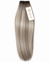 Single machine weft with straight light ash blonde hair with muted darker roots