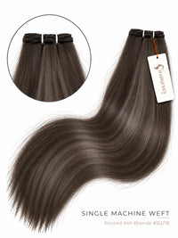 Single machine weft hair bundle in rooted ash gray-brown, straight strands with stitched top.