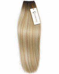 Single machine weft with straight light blonde hair and darker roots