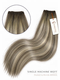 Rooted icy blonde single machine weft with wavy strands in silver-toned gray