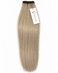 Ash-blonde straight machine weft hair extension, long smooth strands and attached tag