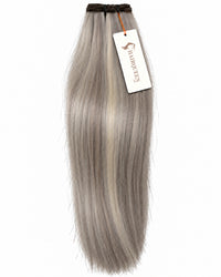 Machine weft hair extension in cool silver blonde, straight