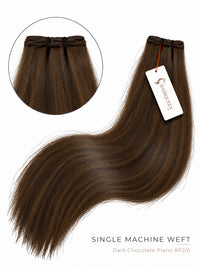 Dark brown machine weft hair extension with soft wave texture, dark weft band and tag