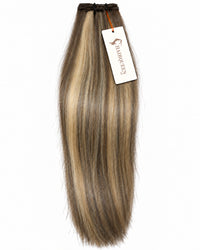 Machine weft hair extension in light ash blonde with darker roots, straight