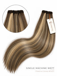 Machine weft hair extension in chestnut honey blonde (#4/27), straight with soft waves