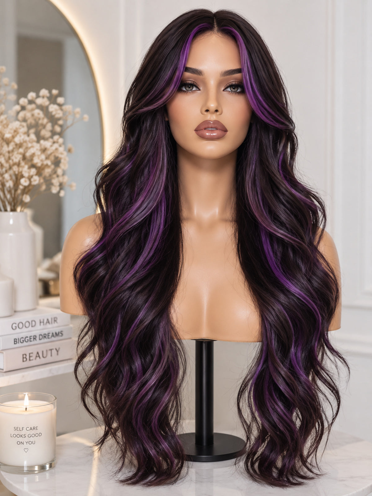 Long wavy synthetic wig with black hair and purple streaks, styled on a stand