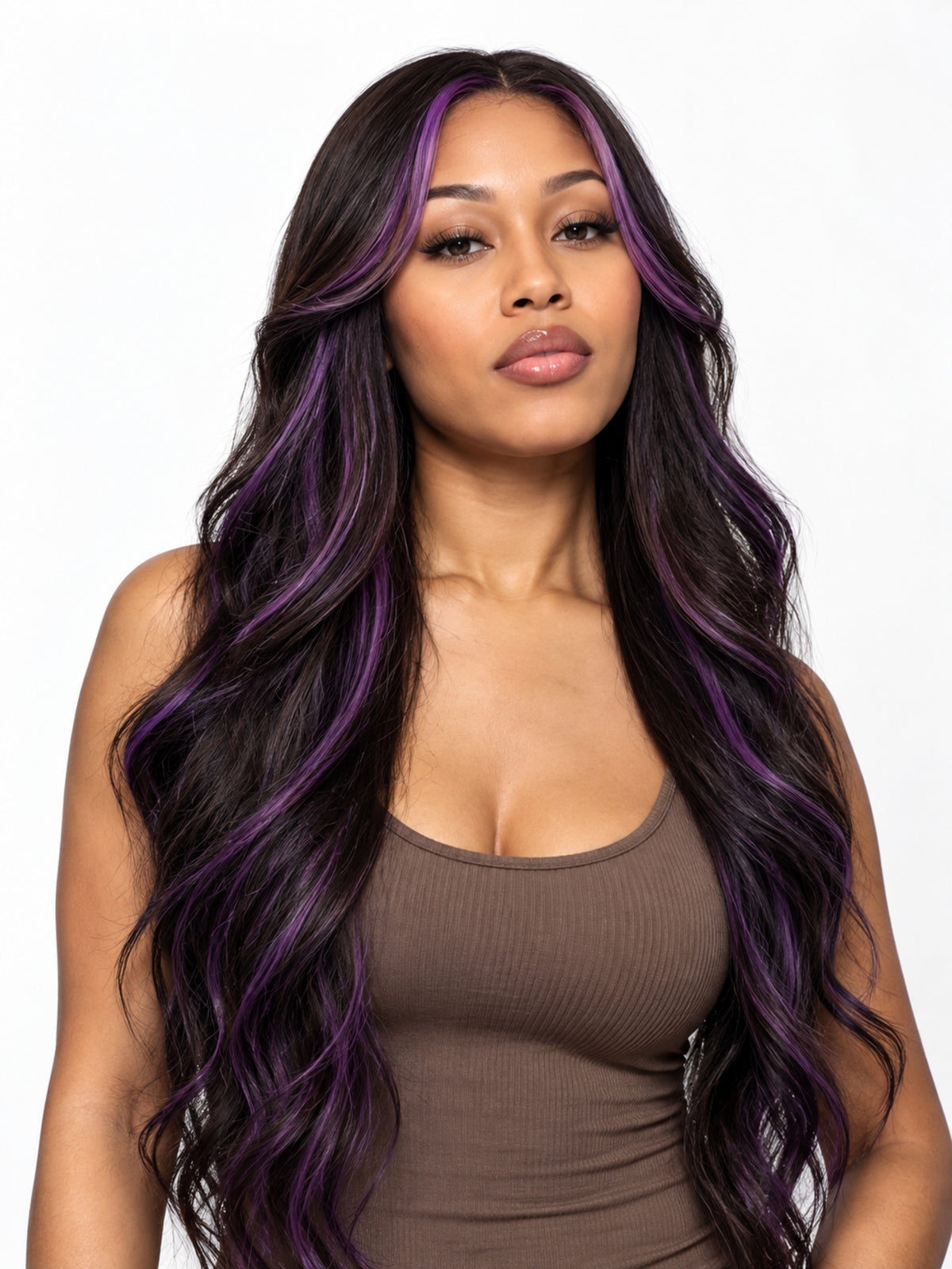 Long wavy synthetic wig with black base and purple highlighted streaks, full front view