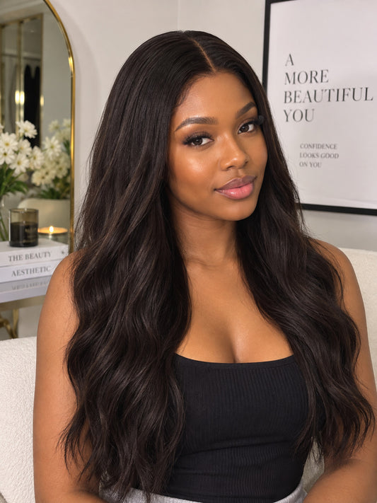 Long dark brown wavy wig with center part, voluminous loose waves and side volume