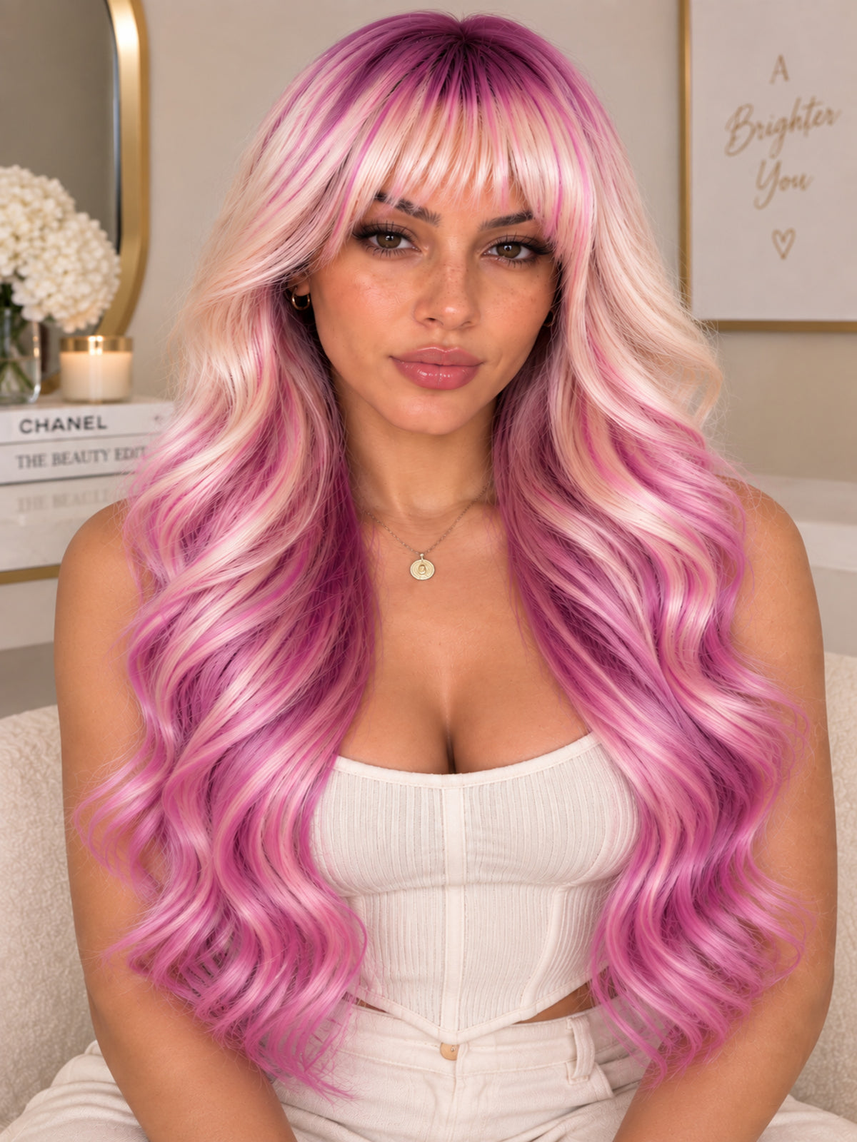 Blonde-to-pink ombre long wavy wig with blunt bangs, synthetic blend
