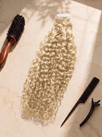 Curly tape-in hair extensions, honey blonde curls with application clips and brush