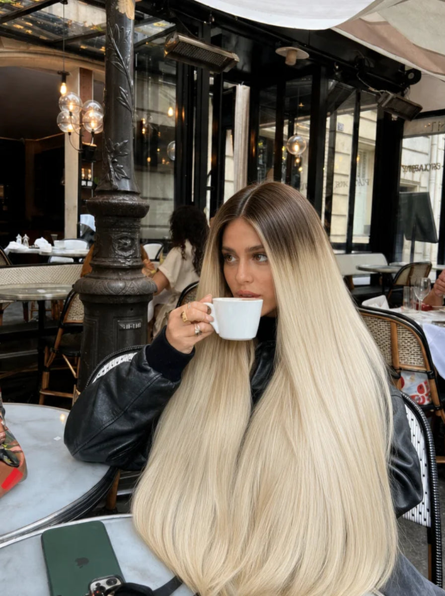 Tape-in hair extensions, long platinum blonde straight hair with blunt ends