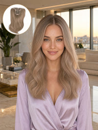 Ash blonde hair topper with long wavy hair on a model