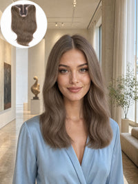 Worn T Hair Topper on model: long wavy medium-brown hair with a soft side part.
