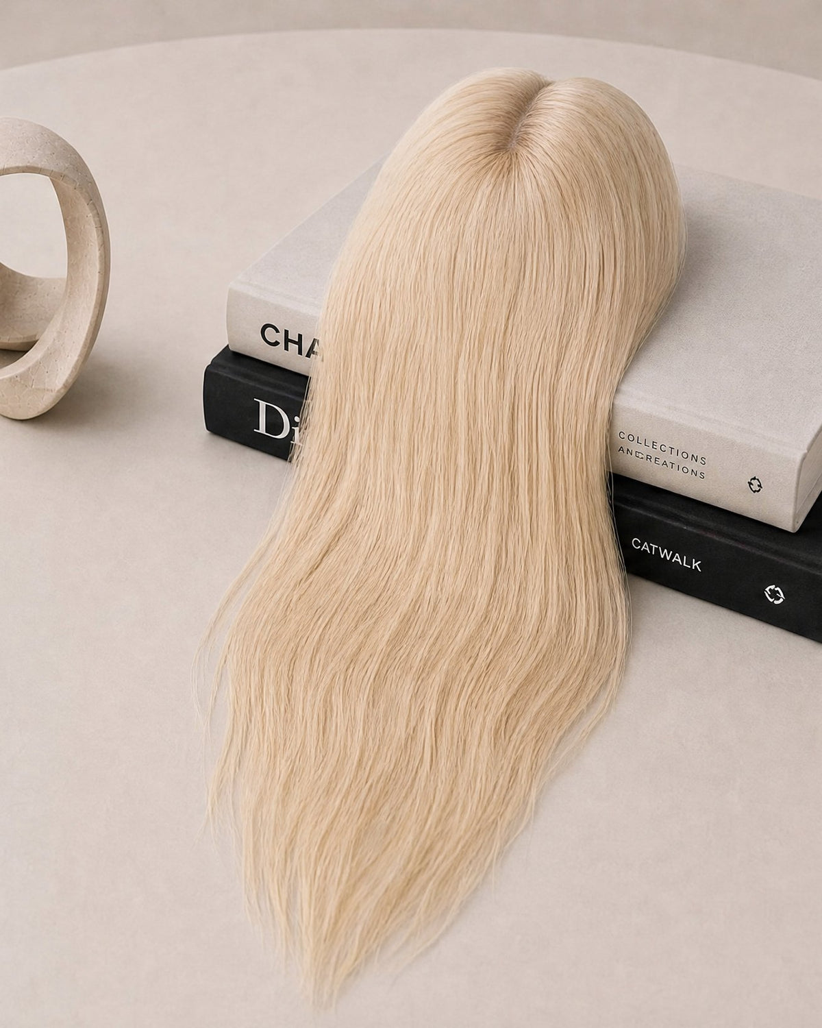 Light blonde hair topper, straight long hair bundle on display
