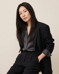 Silk-lace hair topper with long straight dark hair, side-parted