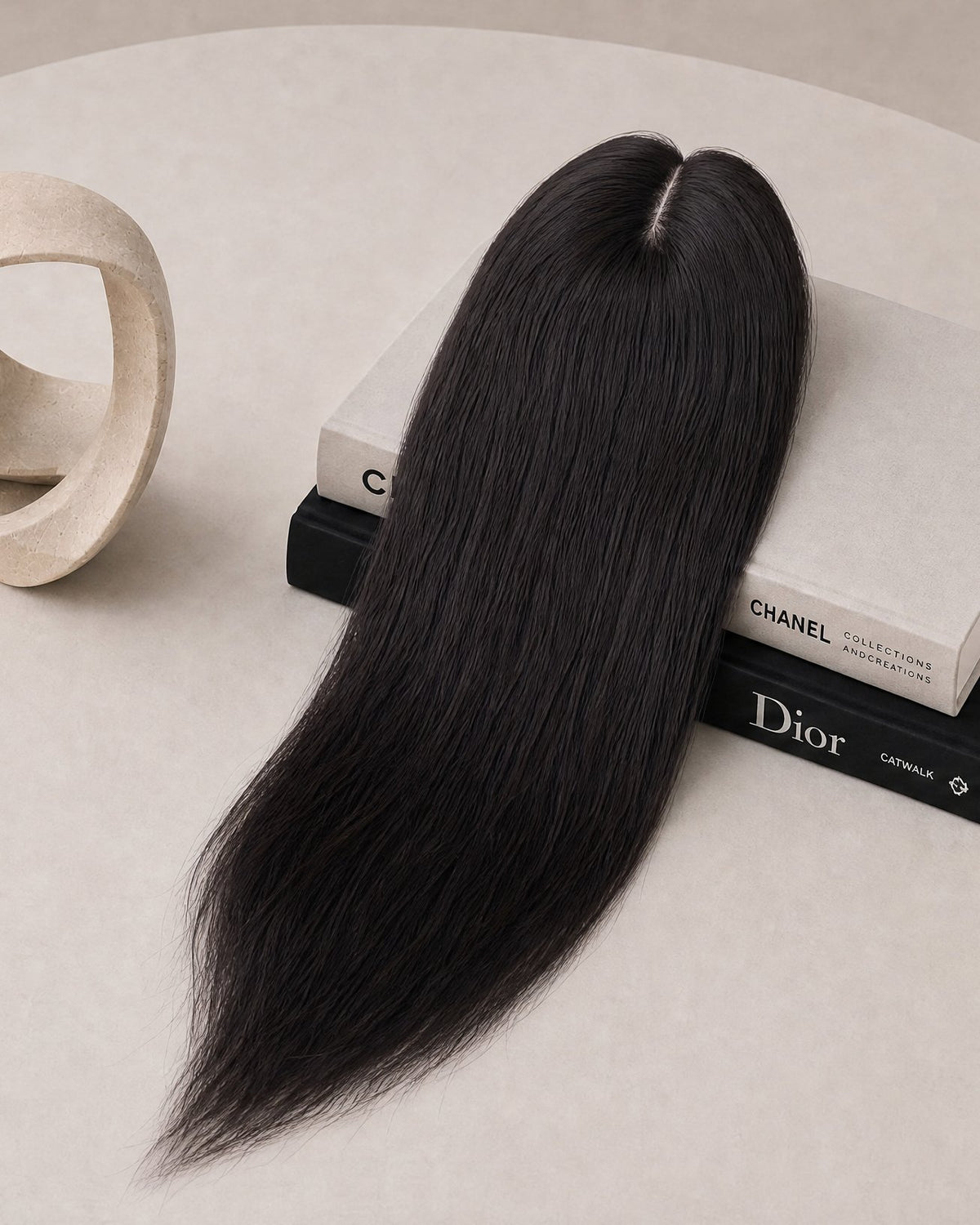 Silk-lace hair topper with long straight black hair and oval lace base with clips