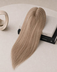 Light blonde hair topper with long straight hair, angled display