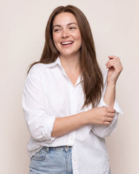 Silicone skin topper with straight dark brown hair, long length, side part.