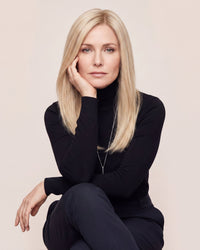 Straight blonde hair topper with natural part, long head-worn style
