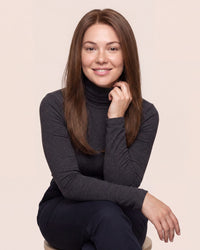 Hairline topper worn by model, long dark brown hair framing face