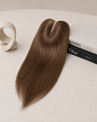 Chocolate brown hair topper with clear base and three fastening clips