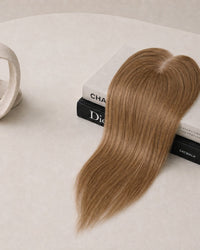 Medium brown hair topper with clear base and three fastening clips
