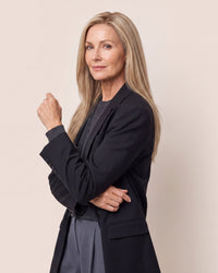 Hairline topper worn by model, long blonde hair styled straight