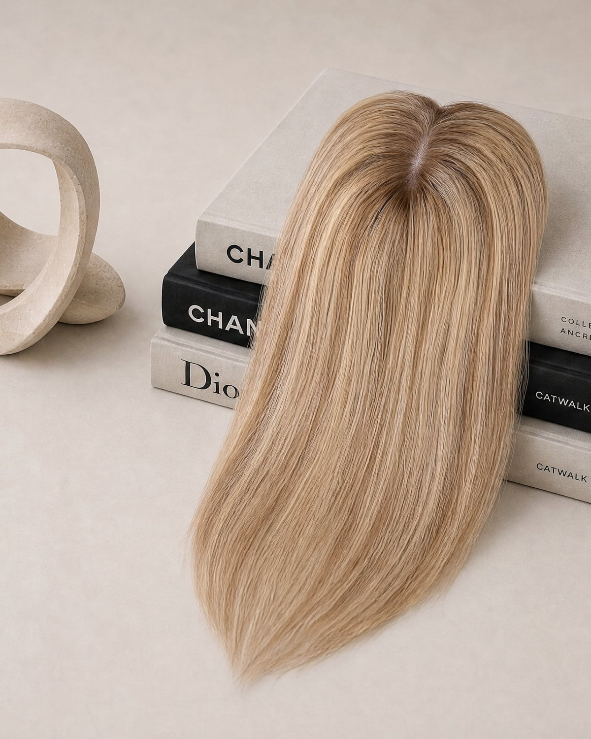 Hairline topper with light blonde, side-swept hair and lace front base with clips