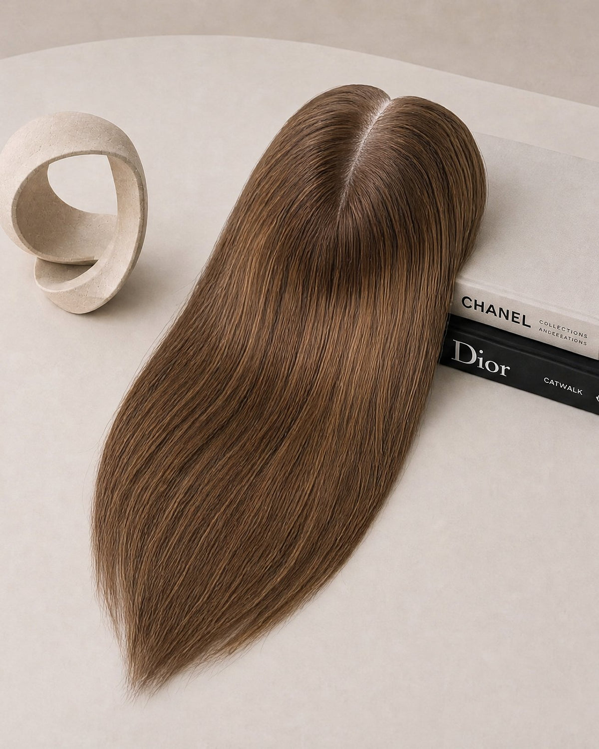 Hairline topper with dark brown, smooth hair and lace front base with two clips