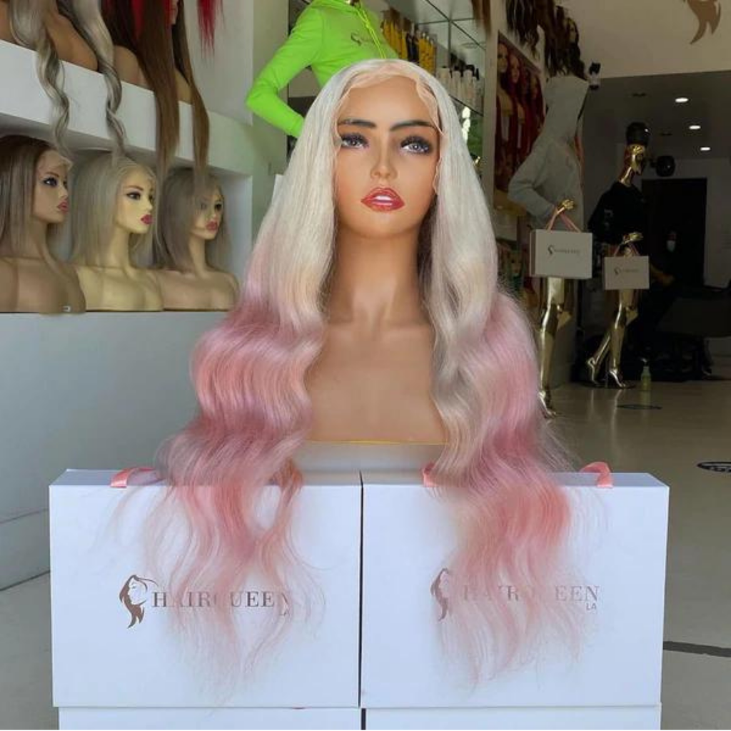 Balayage color class: long wavy platinum hair with soft pink ends.